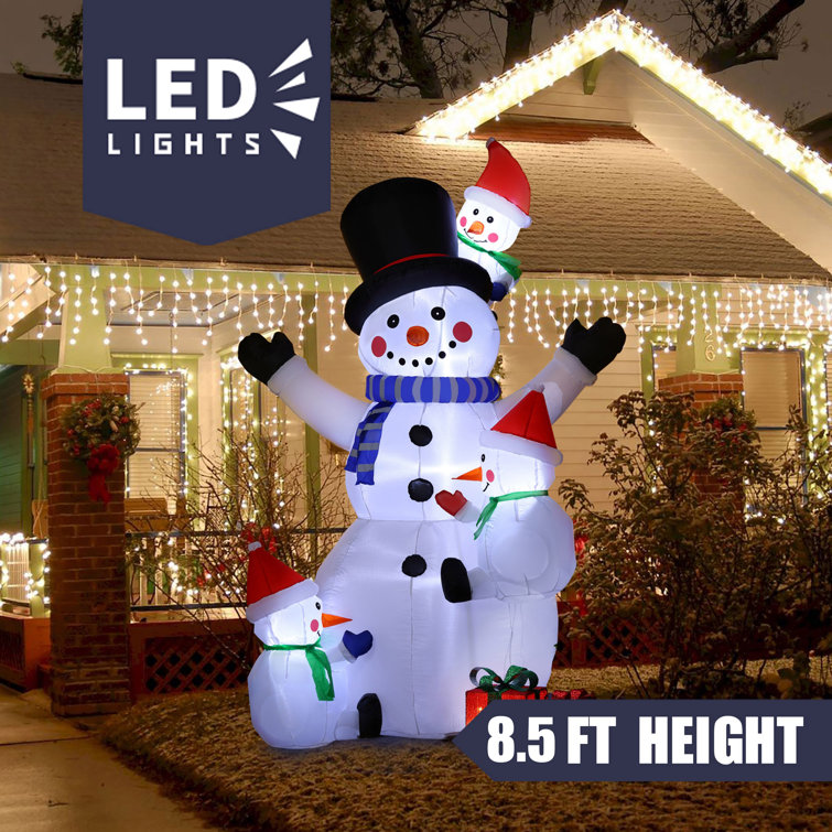 The Holiday Aisle® Inflatable Snowman and Snow Kids with LED